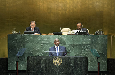 Sam Kahamba Kutesa (centre), President of the sixty-ninth session of the General Assembly, addresses the general debate of the session. (UN Photo/Kim Haughton)